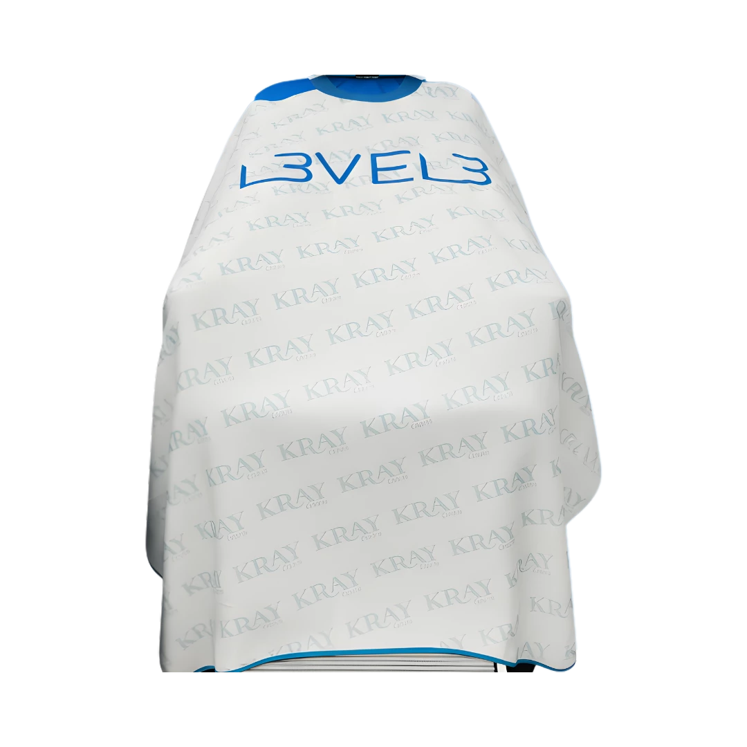 capa-level3-cuello-silicona-blanca-borde-azul-extravagantebarber Capa LEVEL3 Cuello Silicona Blanca Borde Azul - Imagen 1