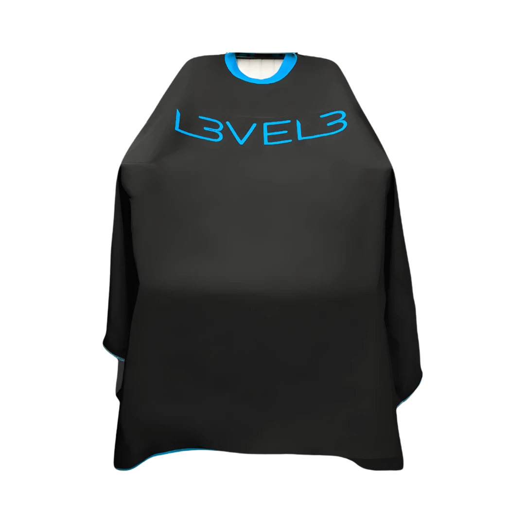 capa-level3-cuello-silicona-negro-borde-azul-extravagantebarber Capa LEVEL3 Cuello Silicona Negra Borde Azul - Imagen 1