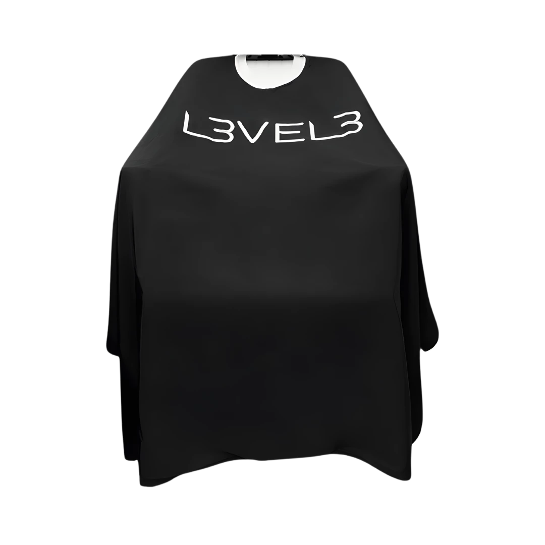 capa-level3-cuello-silicona-negro-borde-blanco-extravagantebarber Capa LEVEL3 Cuello Silicona Negra Borde Blanco - Imagen 1