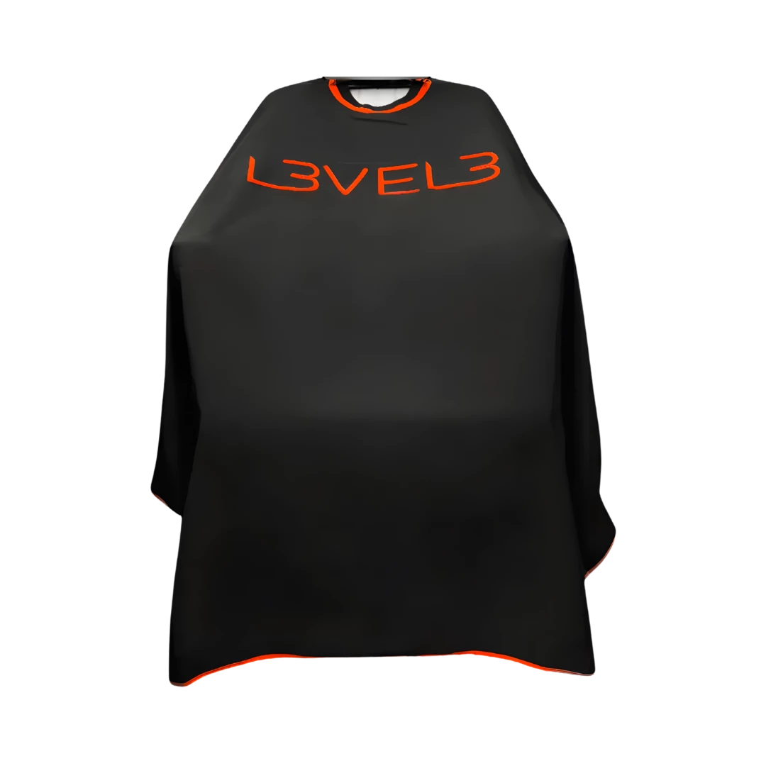 capa-level3-cuello-silicona-negro-borde-rojo-extravagantebarber Capa LEVEL3 Cuello Silicona Negra Borde Rojo - Imagen 1
